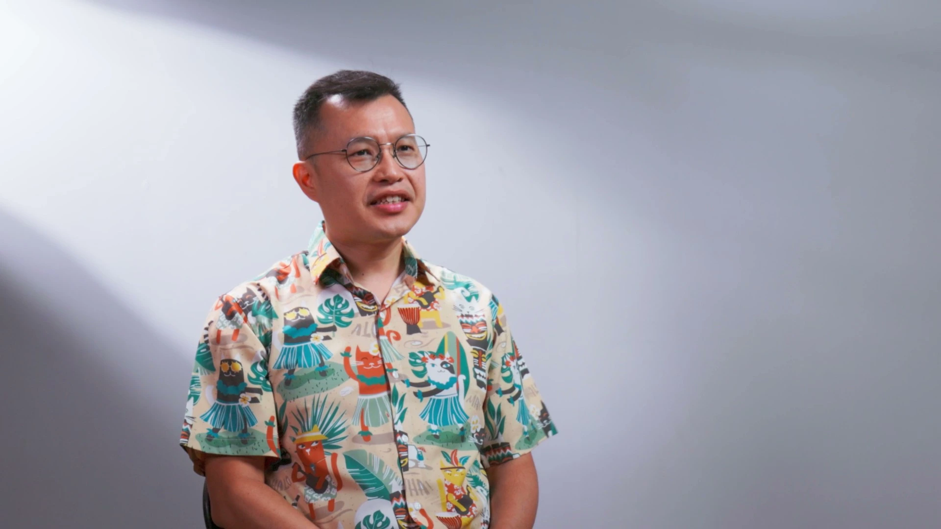 Sen Lai, Principal of 3dsense Media School, seated for an interview, sharing insights about the school and industry.