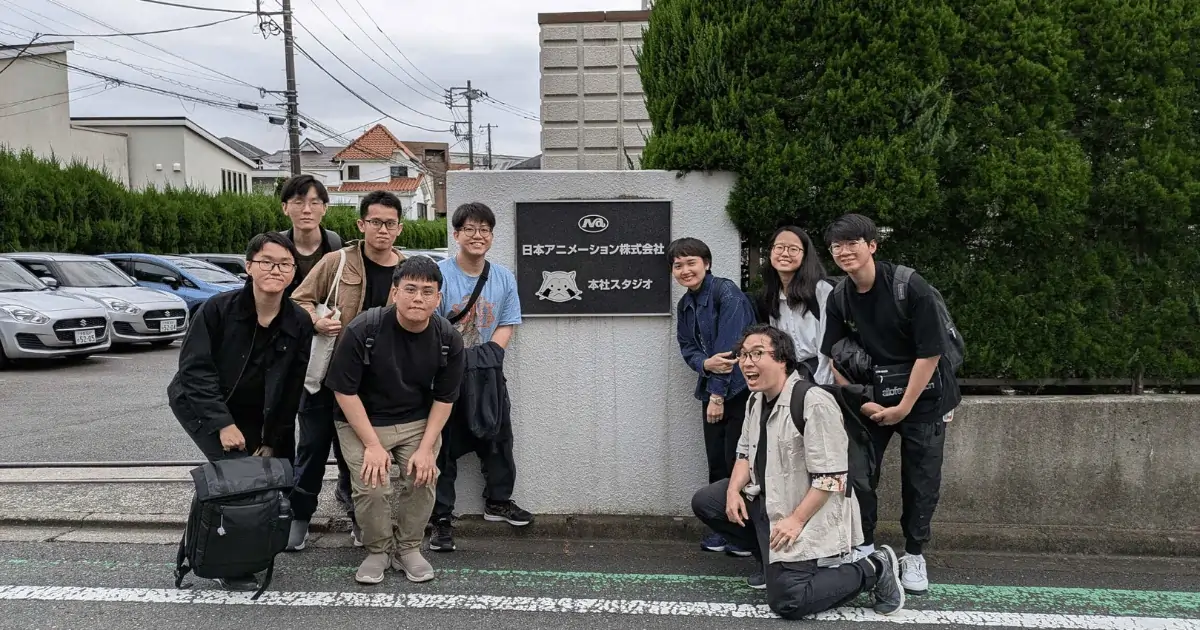 3dsense Media School students posing outside Nippon Animation during their Immersive Residency Program.