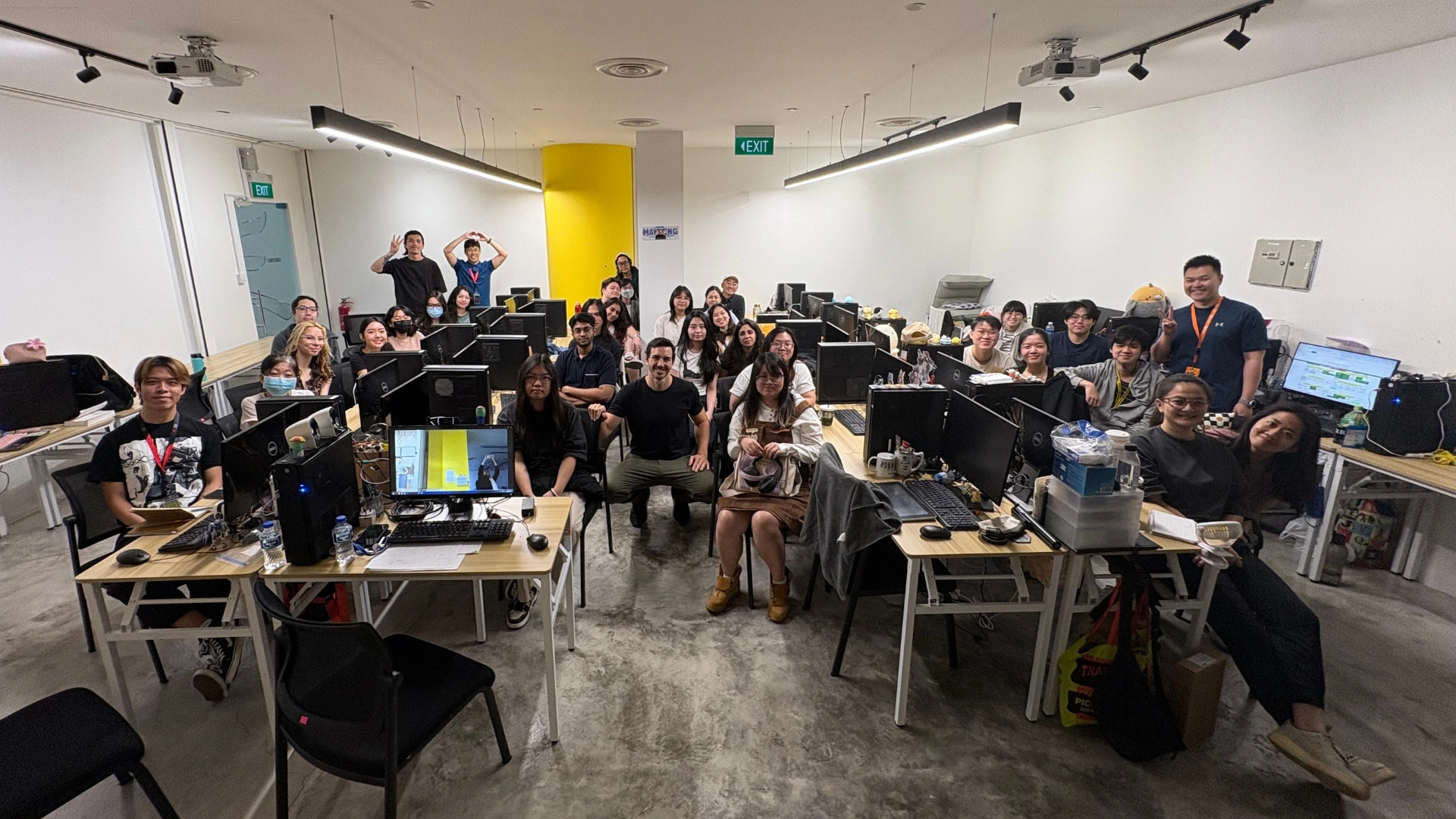 Tomas Sackmann, Head of CGI at Tencent Singapore, leading an Adobe Substance 3D workshop for 3dsense Motion Design students in a classroom setting.
