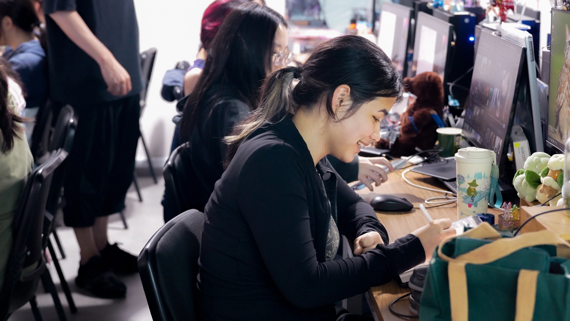 3dsense Media School student drawing on a Wacom tablet during a digital art class